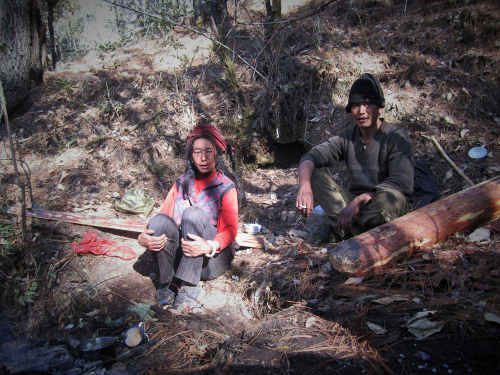 Lunch break in a dry riverbed during woodcutting chores. Photo Pascale-Marie Milan, 2012.